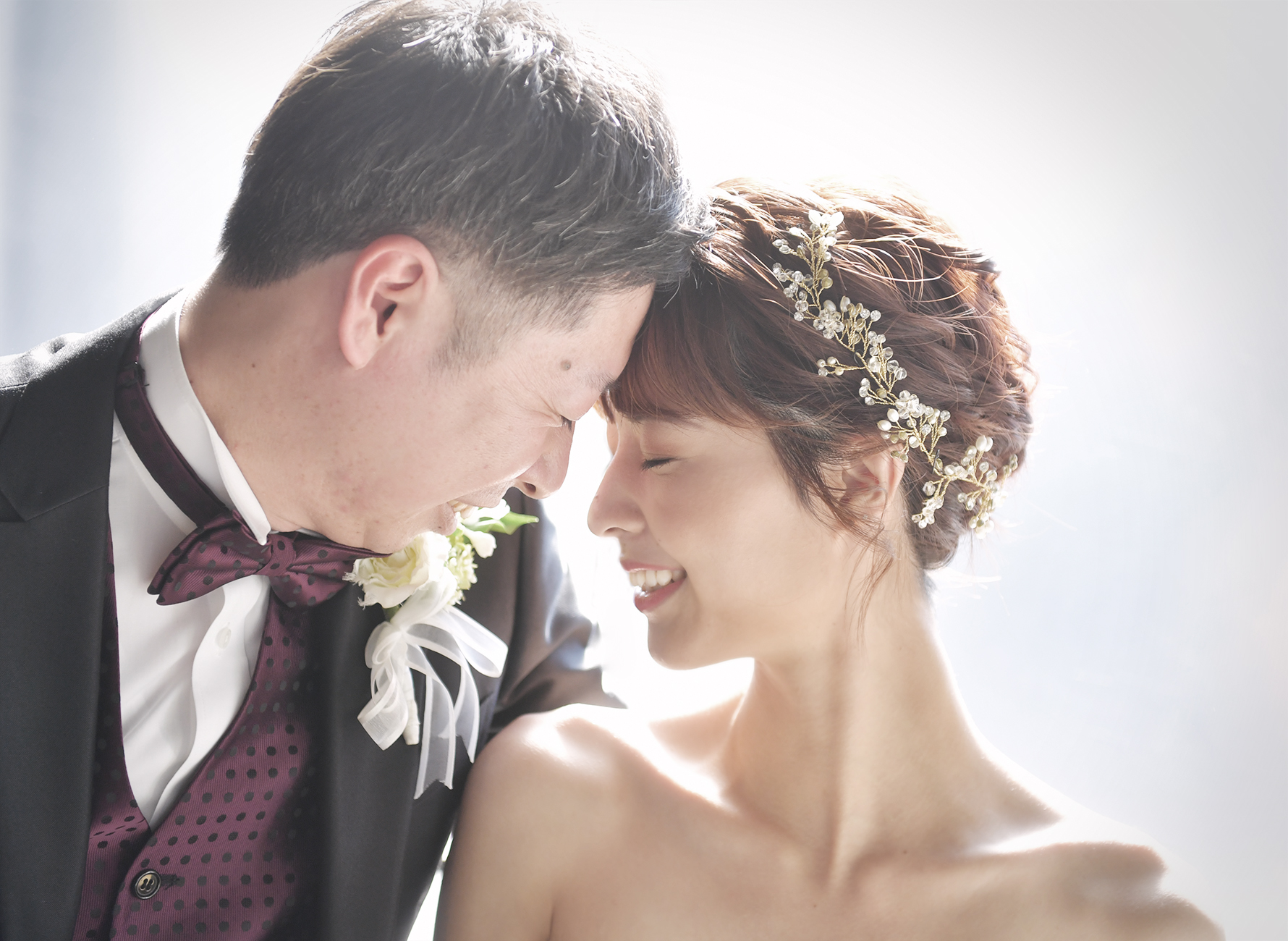 奈良市の写真館スタジオオレンジで撮影したウェディングフォト ウェディングドレスでの婚礼写真 新郎新婦